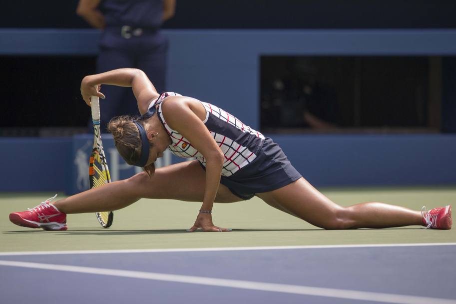 La scivolata di Monica Puig durante la partita contro Venus Williams. (Reuters)